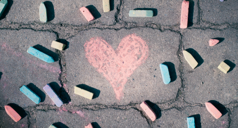 Heart drawn in chalk on a driveway