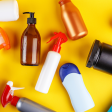 Cleaning bottles on a yellow background