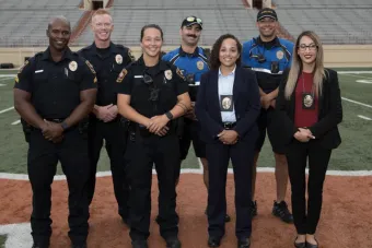 UT police officers standing together, smiling