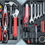 Opened toolbox full of wrenches
