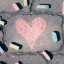 Heart drawn in chalk on a driveway