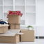 Packed moving boxes stacked in an empty apartment