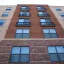 Wall of an apartment complex with windows