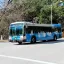 City bus driving on campus