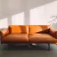 Orange couch by a window