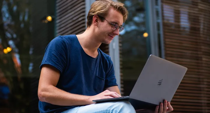 Man holding a laptop