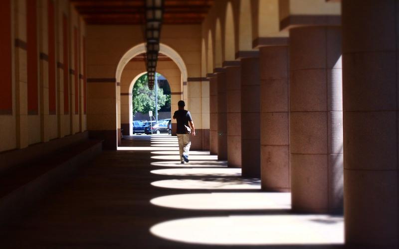 Man walking alone in a corridor